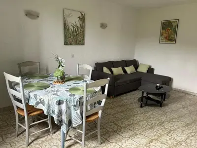 Coin salon dans l'établissement Appartement convivial à Marignana, proche de la nature