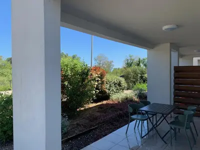 Jardin de l'établissement Appartement T2 bord de mer N165