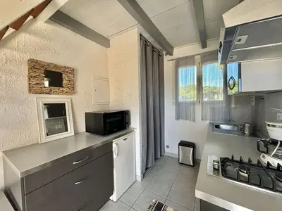 Cuisine ou kitchenette dans l'établissement Studio avec mezzanine 4 couchages LUMIO
