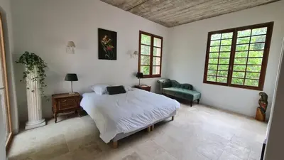 Un ou plusieurs lits dans un hébergement de l'établissement Maison - chambres d'hotes