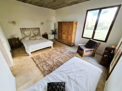 Un ou plusieurs lits dans un hébergement de l'établissement Maison - chambres d'hotes