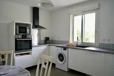 Cuisine ou kitchenette dans l'établissement Haut de villa