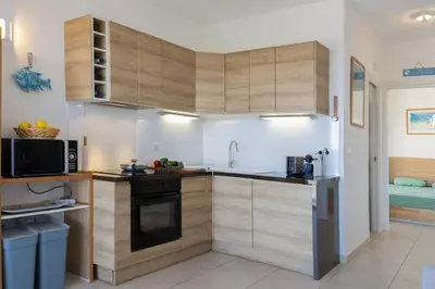 Cuisine ou kitchenette dans l'établissement Casa Ange - Appartement vue mer