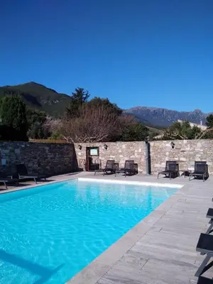 Piscine de l'établissement Studio dans résidence avec piscine à Sisco ou située à proximité