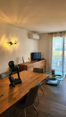 Télévision ou salle de divertissement dans l'établissement Duplex Horizon Bleu