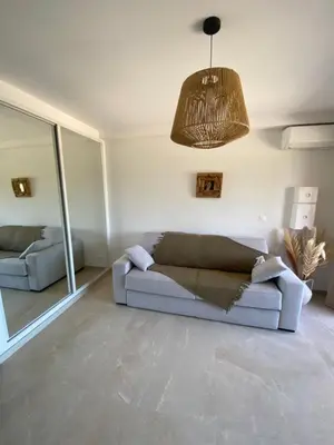 Coin salon dans l'établissement T2 Calvi vue mer