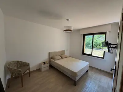 Un ou plusieurs lits dans un hébergement de l'établissement Maison proche des plages