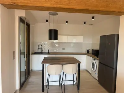 Cuisine ou kitchenette dans l'établissement Maison proche des plages
