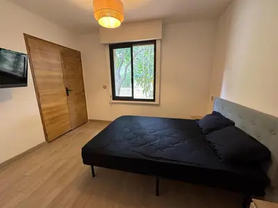 Un ou plusieurs lits dans un hébergement de l'établissement Maison proche des plages