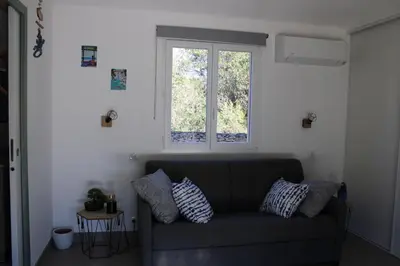 Coin salon dans l'établissement Studio Villa Boca