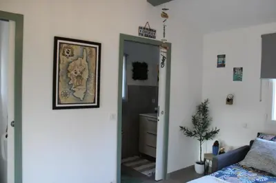 Un ou plusieurs lits dans un hébergement de l'établissement Studio Villa Boca