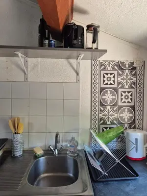 Cuisine ou kitchenette dans l'établissement Appartement calme & cosy vue montagne