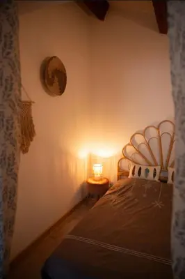 Un ou plusieurs lits dans un hébergement de l'établissement Appartement calme & cosy vue montagne