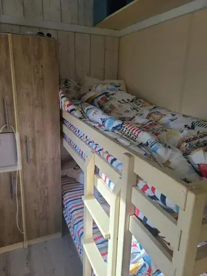Un ou plusieurs lits dans un hébergement de l'établissement Chalet en bois climatisé À 300 m de la plage Marina di Sorbo 6 personnes