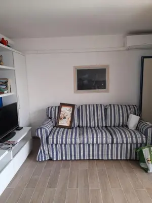 Coin salon dans l'établissement Vaccagia - 2 chambres - a 2 pas de la plage