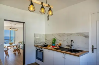 Cuisine ou kitchenette dans l'établissement Casa des Iles