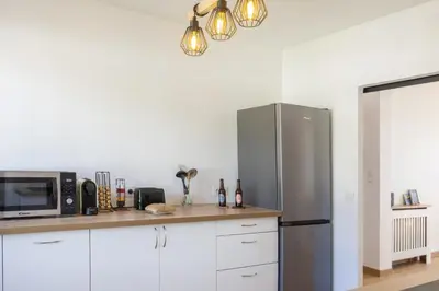 Cuisine ou kitchenette dans l'établissement Casa des Iles