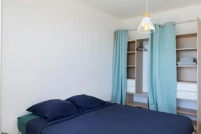 Un ou plusieurs lits dans un hébergement de l'établissement Casa des Iles