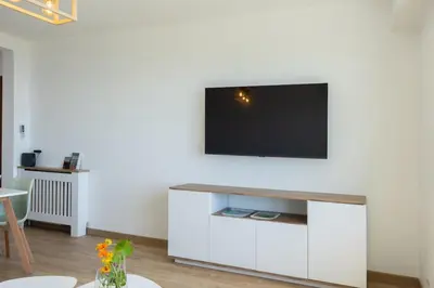 Télévision ou salle de divertissement dans l'établissement Casa des Iles