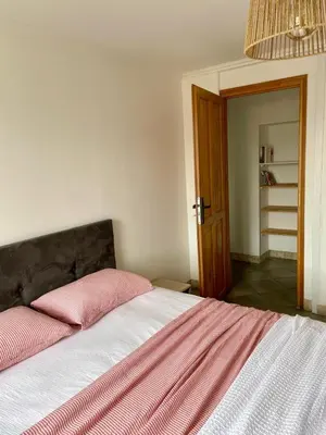 Un ou plusieurs lits dans un hébergement de l'établissement Appartement Corte centre ville