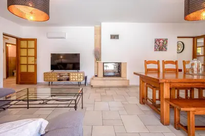 Télévision ou salle de divertissement dans l'établissement Villa Amarena