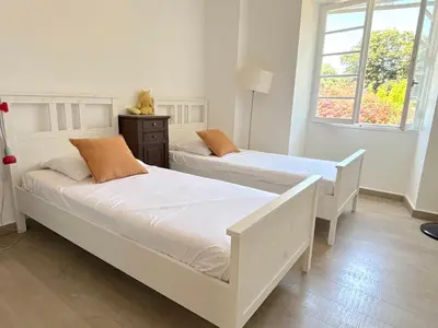 Un ou plusieurs lits dans un hébergement de l'établissement Villa Padulone