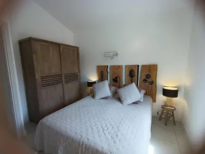 Un ou plusieurs lits dans un hébergement de l'établissement Duplex rose- Sérénité en Bord de Mer
