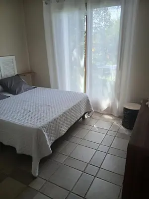 Un ou plusieurs lits dans un hébergement de l'établissement joli appartement lumio