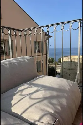 Un ou plusieurs lits dans un hébergement de l'établissement Apartment in Ile Rousse with sea view