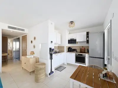 Cuisine ou kitchenette dans l'établissement Appartement avec vue sur la mer et la citadelle