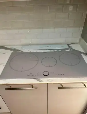 Cuisine ou kitchenette dans l'établissement Appartement T3 Place du Marché