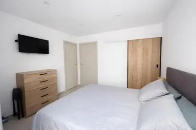 Un ou plusieurs lits dans un hébergement de l'établissement Appartement T3 Place du Marché