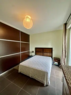 Un ou plusieurs lits dans un hébergement de l'établissement Apartment with sea view and access