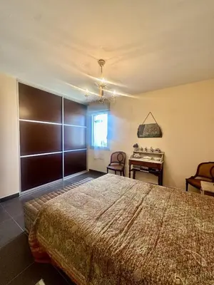 Un ou plusieurs lits dans un hébergement de l'établissement Apartment with sea view and access