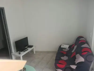 Télévision ou salle de divertissement dans l'établissement appartement indépendant CORTE