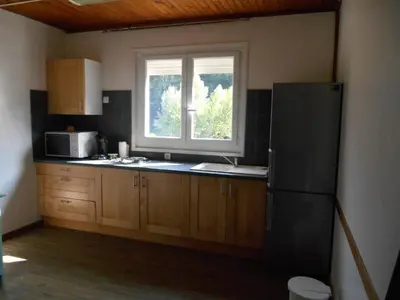 Cuisine ou kitchenette dans l'établissement B&B la rivière