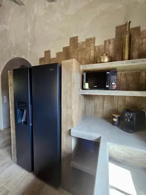 Cuisine ou kitchenette dans l'établissement U Loghju