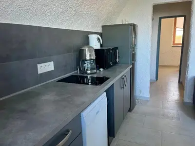 Cuisine ou kitchenette dans l'établissement Appartement confortable avec vue sur le port