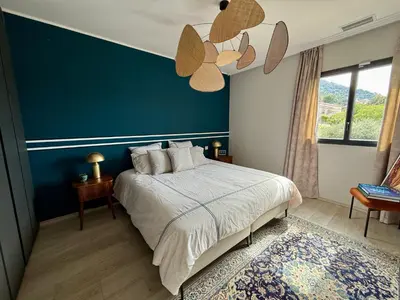 Un ou plusieurs lits dans un hébergement de l'établissement Appartement standing grande terrasse vue mer