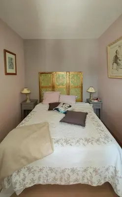 Un ou plusieurs lits dans un hébergement de l'établissement Appartement dans villa avec jardin privatif
