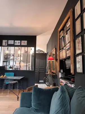 Coin salon dans l'établissement Appartement dans villa avec jardin privatif