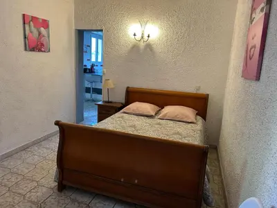Un ou plusieurs lits dans un hébergement de l'établissement Appartement confortable à Marignana, 50 m² avec 3 chambres