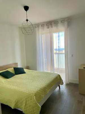 Un ou plusieurs lits dans un hébergement de l'établissement T2 moderne et lumineux, clim, terrasse et vue mer