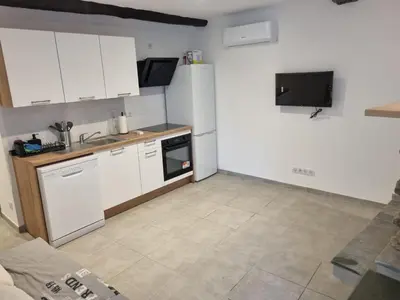 Cuisine ou kitchenette dans l'établissement Maison Samuela