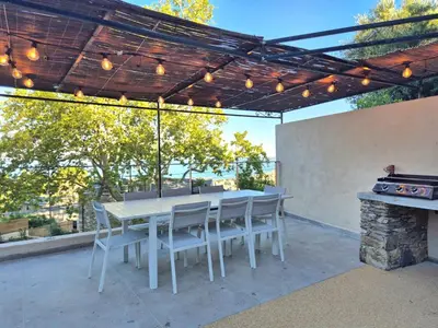 Balcon ou terrasse dans l'établissement Splendide villa avc piscine-les Collines Bastia