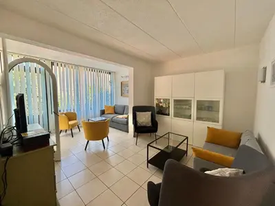 Coin salon dans l'établissement Appartement T3 Solane 31 LUMIO