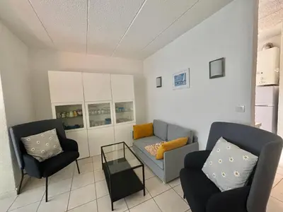 Coin salon dans l'établissement Appartement T3 Solane 31 LUMIO