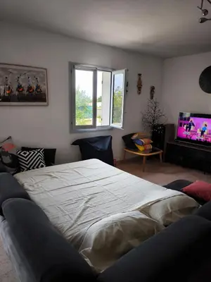 Un ou plusieurs lits dans un hébergement de l'établissement Sud Bastia 50 m2 privé avec jacuzzi et piscine