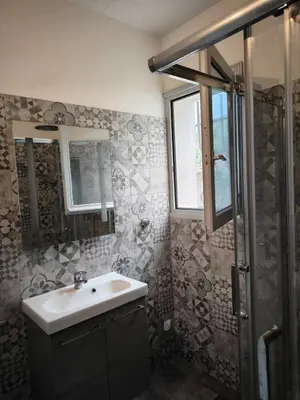 Salle de bains dans l'établissement Sud Bastia 50 m2 privé avec jacuzzi et piscine