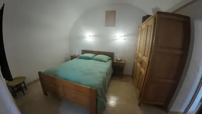 Un ou plusieurs lits dans un hébergement de l'établissement Appartement Spacieux Vue Montagne- Parking gratuit- Proche ÎLE ROUSSE